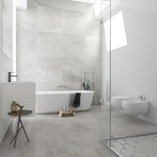 Dorset luxury vinyl tile LVT flooring in stone-look finish, with optional design strips for a grout-effect look.