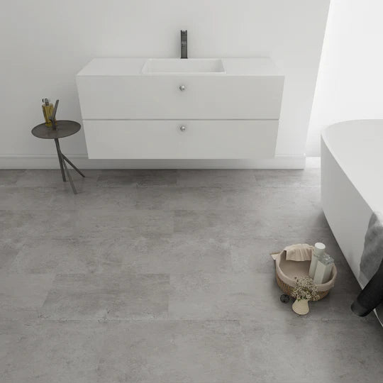 Glue-down installation Dorset LVT flooring from Brampton Chase with optional design strips for a ceramic tile effect.