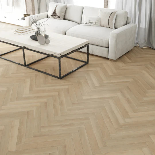 Blonde Oak Herringbone LVT with gluedown installation, offering durability and water resistance.