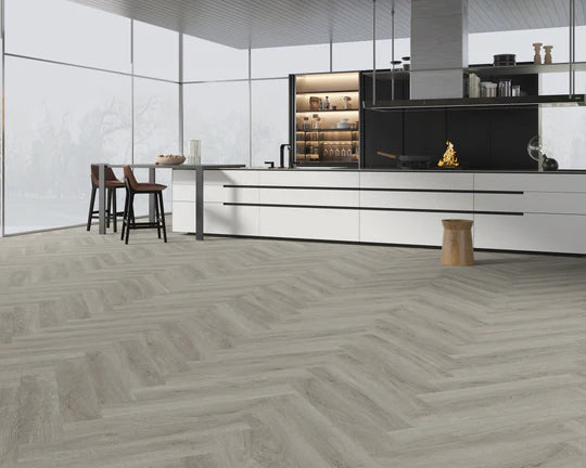 Durable and stylish Pebble Shore Herringbone luxury vinyl tile, perfect for residential and commercial spaces.
