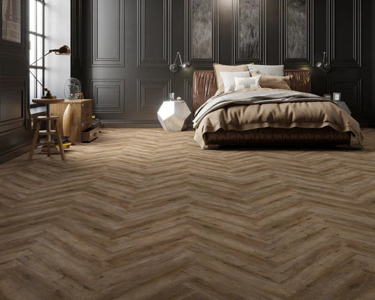 Close-up of Smokey Bay LVT herringbone pattern, showcasing its modern, sleek design.