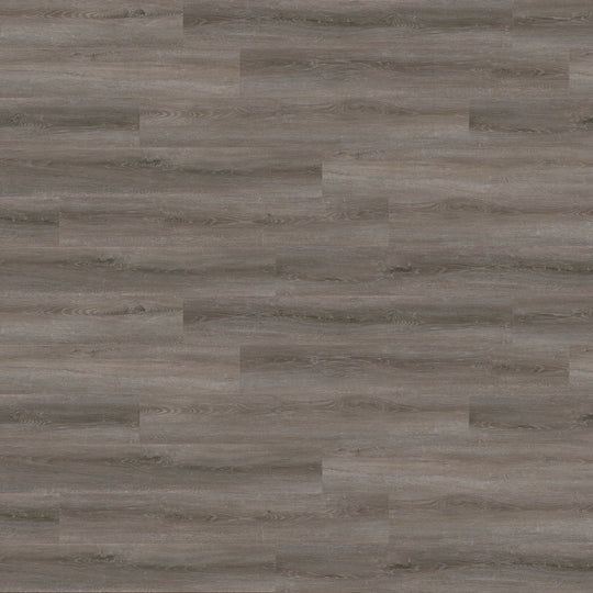 Close-up of Urban Dusk LVT, highlighting its sleek, modern dark wood finish in large plank format.