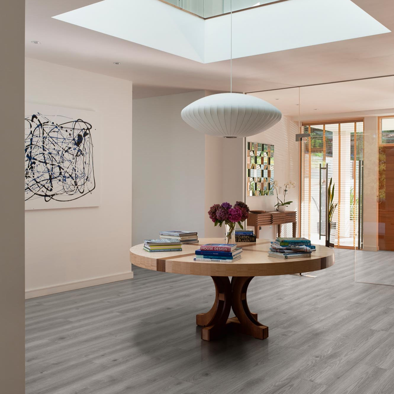 Timberwolf Plank LVT by Rhinofloor with grey wood tones for elegant interiors.