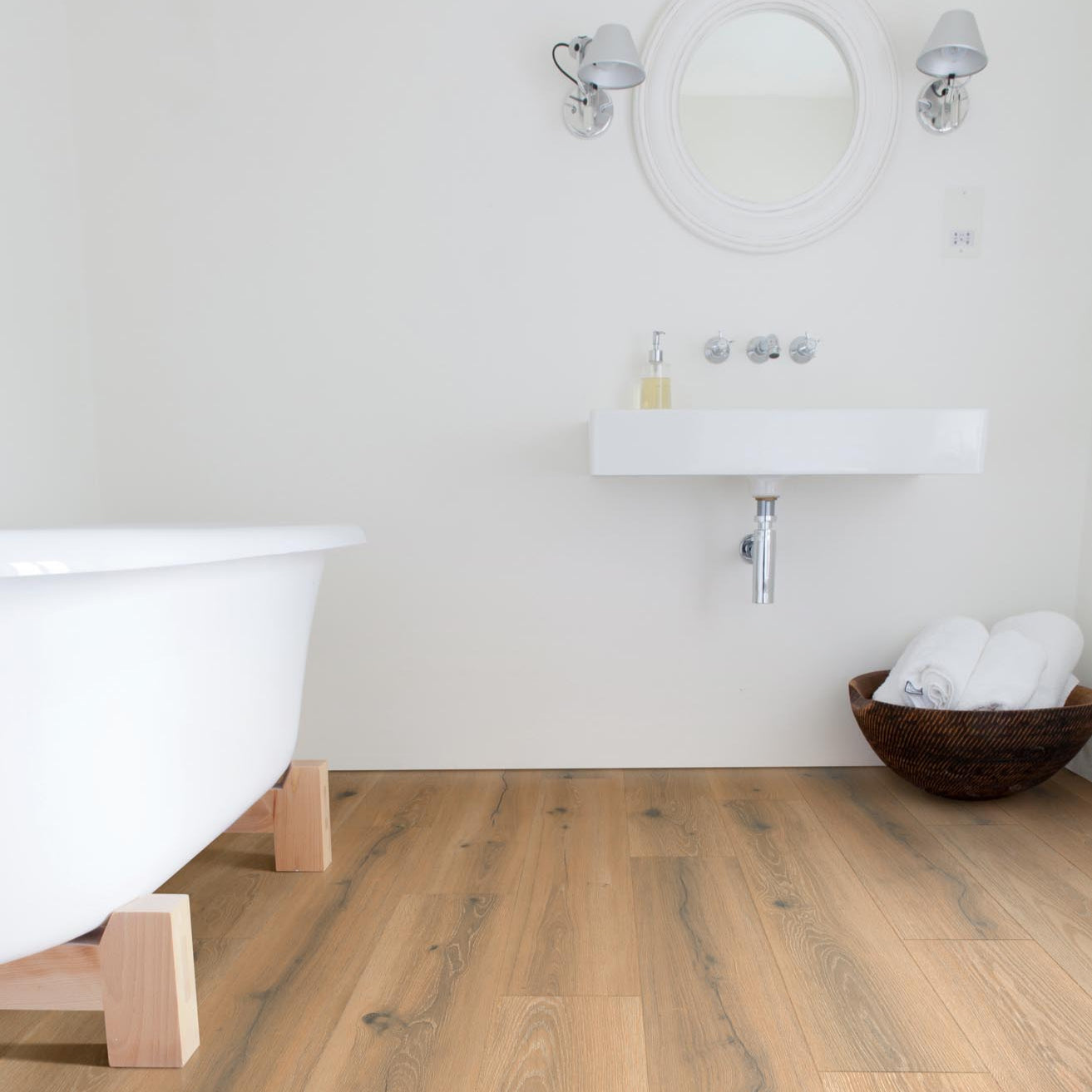 Elegant golden wood-effect Medburn Plank LVT by Rhinofloor for modern interiors.