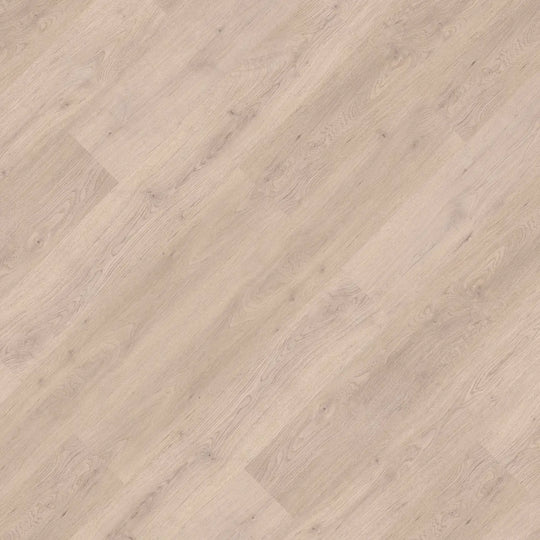 Close-up of Ivory White LVT, showcasing its fresh, light oak finish in large plank format.