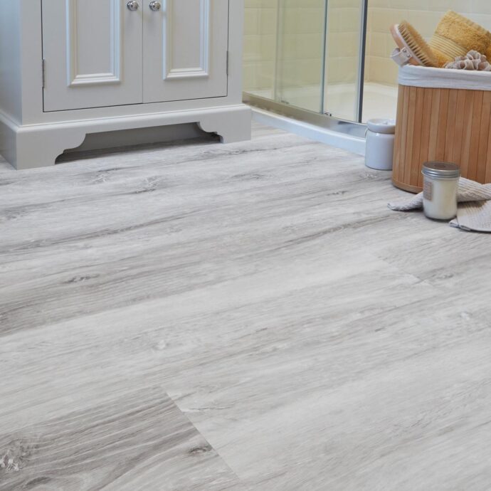 Glacier Oak LVT flooring, available at AClass Flooring – light, cool oak tones with a natural wood effect, ideal for modern and rustic interiors.