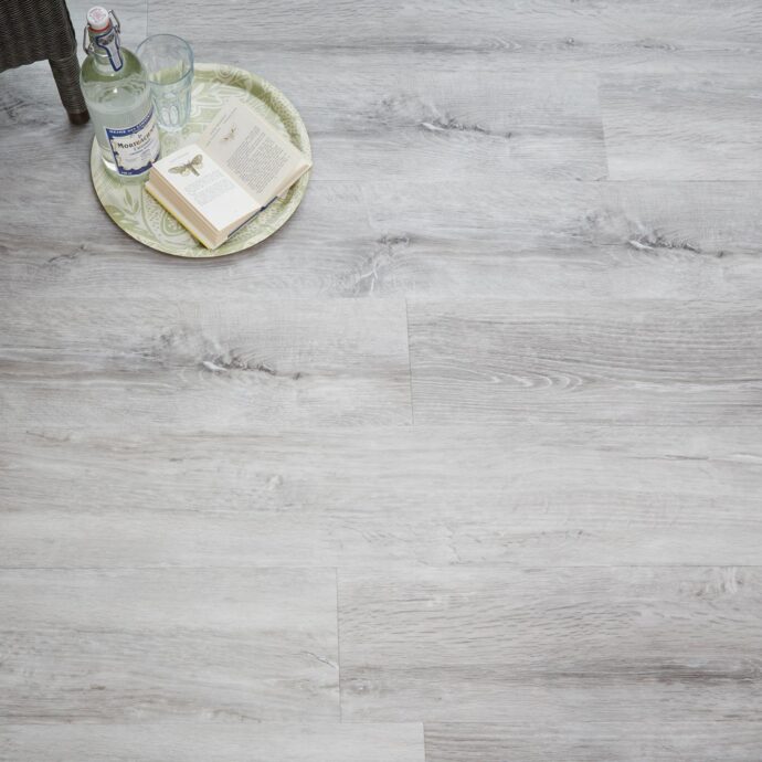 Close-up of Glacier Oak LVT flooring by AClass Flooring – durable, waterproof, and scratch-resistant luxury vinyl tile, perfect for high-traffic areas.