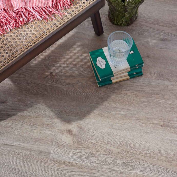 Close-up of Regal Timber LVT plank highlighting elegant wood grain detail in grey and brown tones.