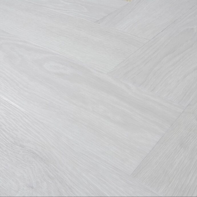 Alpine Mist Parquet herringbone luxury vinyl tile LVT flooring in misty oak tones, part of the Natural Timbers Parquet collection.