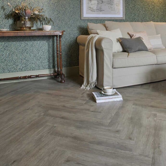 Fumed Oak Light Parquet herringbone luxury vinyl tile LVT flooring in light oak tones, part of the Natural Timbers Parquet collection.