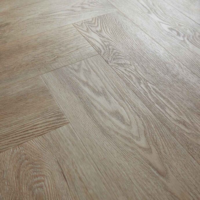 Durable LVT herringbone flooring with a 0.55mm wear layer and bevelled edges, perfect for modern and traditional interiors.