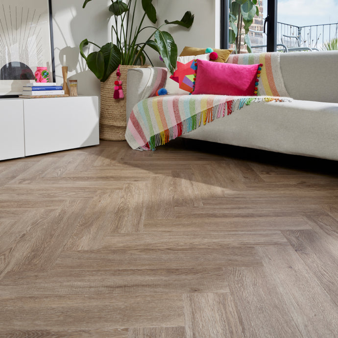 Regal Timber Parquet herringbone LVT flooring in light and medium oak tones from the Natural Timbers Parquet collection.