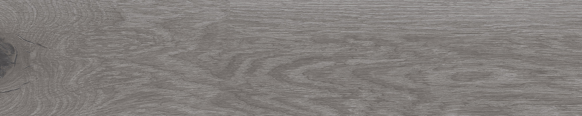Close-up of Parquet Timberwolf LVT herringbone pattern, showcasing the intricate design and warm grey tones