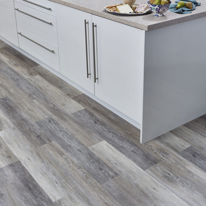 Grey Driftwood LVT flooring by AClass Flooring – soft grey tones with a weathered driftwood effect for a serene, coastal-inspired wood-look finish.