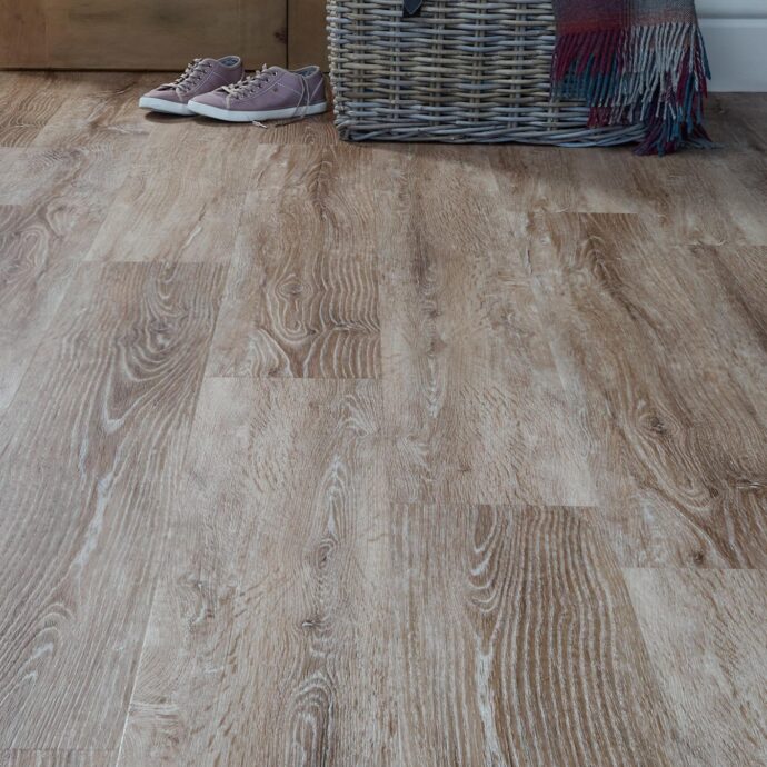Close-up of Rift Sawn Oak plank LVT flooring by AClass Flooring – scratch-resistant, durable luxury vinyl tile perfect for high-traffic residential and commercial areas.