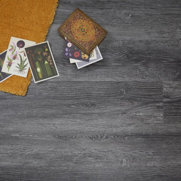 Close-up of Smoked Limewash Plank LVT flooring by J2 Flooring – scratch-resistant and easy-to-clean vinyl flooring for modern interiors.