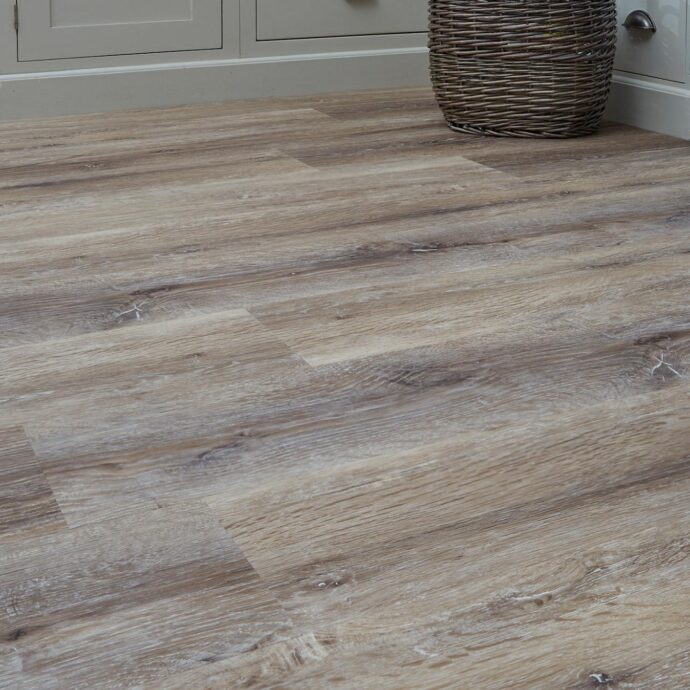 Taupe Brushed Oak Plank LVT flooring, available at AClass Flooring – neutral oak effect with a brushed texture, ideal for stylish interiors.