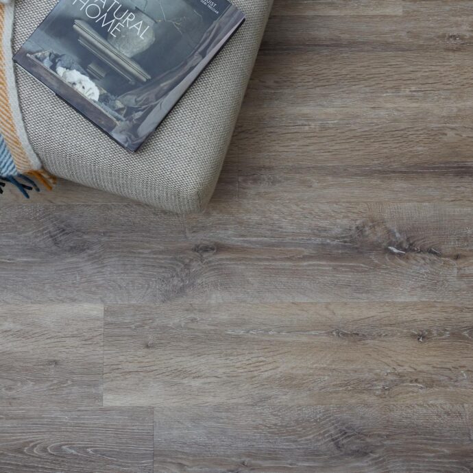 Taupe Brushed Oak Plank LVT flooring by AClass Flooring – sleek, water-resistant luxury vinyl tile with a timeless oak effect for a sophisticated look.