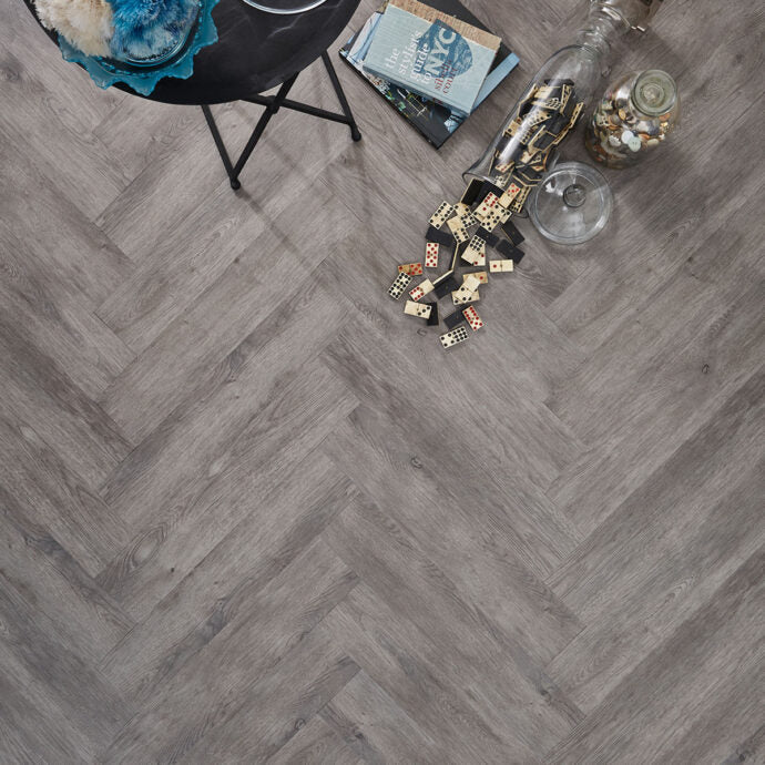 Weathered Timber Parquet herringbone luxury vinyl tile LVT flooring in weathered wood tones, part of the Natural Timbers Parquet collection.
