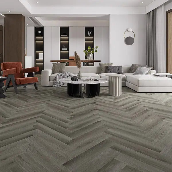 Nebraska Wild Oak herringbone LVT in a stylish living room setting, featuring warm wood tones.