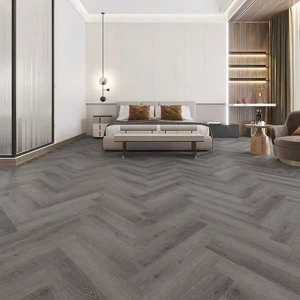 Room view featuring Alva Hickory Grey Oak LVT in a herringbone design, enhancing the space with modern elegance