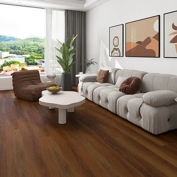 Cherokee Oak plank LVT flooring in a bright, modern living room, showcasing natural wood tones.