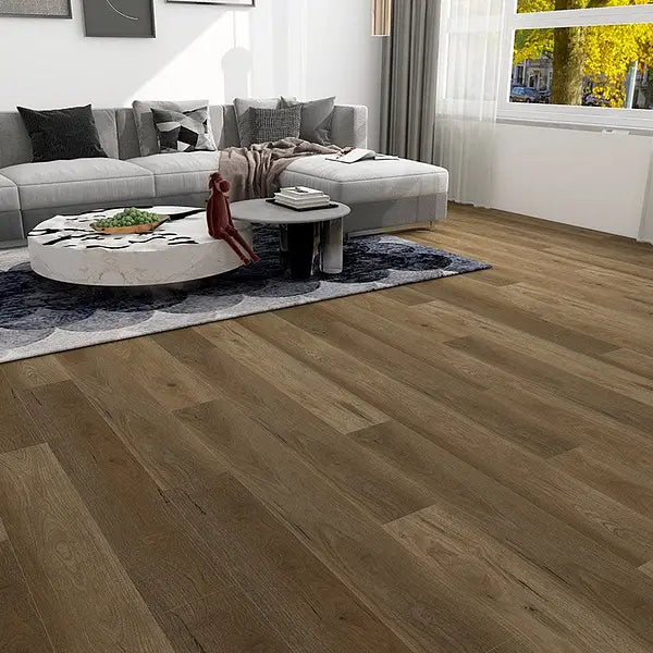 English Oak LVT plank flooring in a stylish living room, blending traditional and modern elements.
