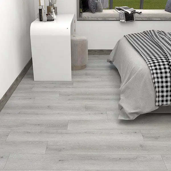 Alva Plank LVT Collection in Havana Grey, installed in a stylish modern bedroom