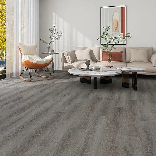 Alva Plank LVT Collection in Hickory Grey Oak, installed in a stylish living room