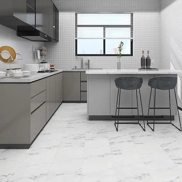Arabescato Tile LVT installed in a modern kitchen diner, showcasing its marble-like finish and sleek design.