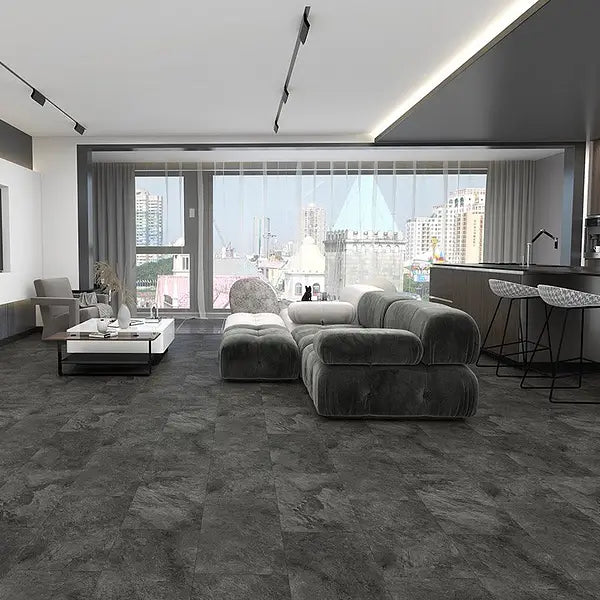 Dark Slate Tile LVT installed in a modern kitchen and living room, showcasing the realistic stone look.