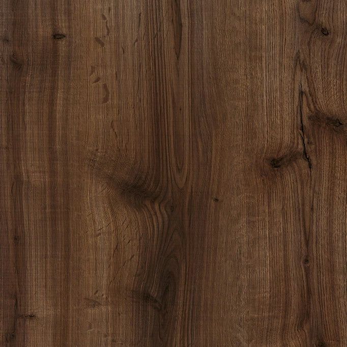 Close-up texture of Karma laminate flooring with a real wood finish