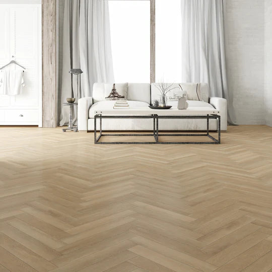 Blonde Oak Herringbone LVT with gluedown installation, offering durability and water resistance.