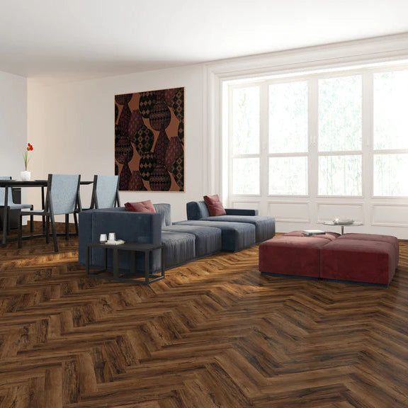 Chicory Haze Herringbone LVT with grey and beige tones and a micro bevel edge.