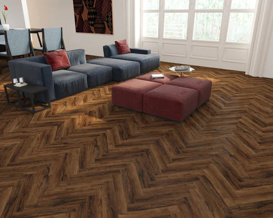 Chicory Haze Herringbone LVT in a sophisticated grey-beige palette, ideal for modern spaces.