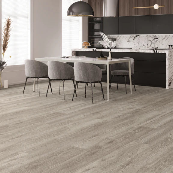 County Oak Large Plank luxury vinyl tile (LVT) featuring a rich oak wood-effect and micro bevel edges.