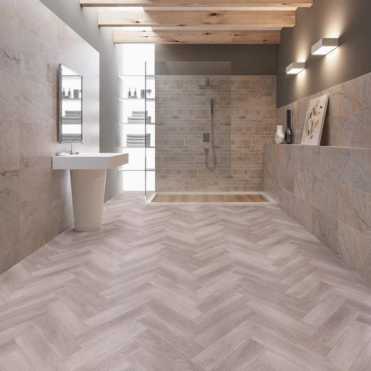 Heather Grey Herringbone LVT featuring a neutral grey tone with a micro bevel edge.