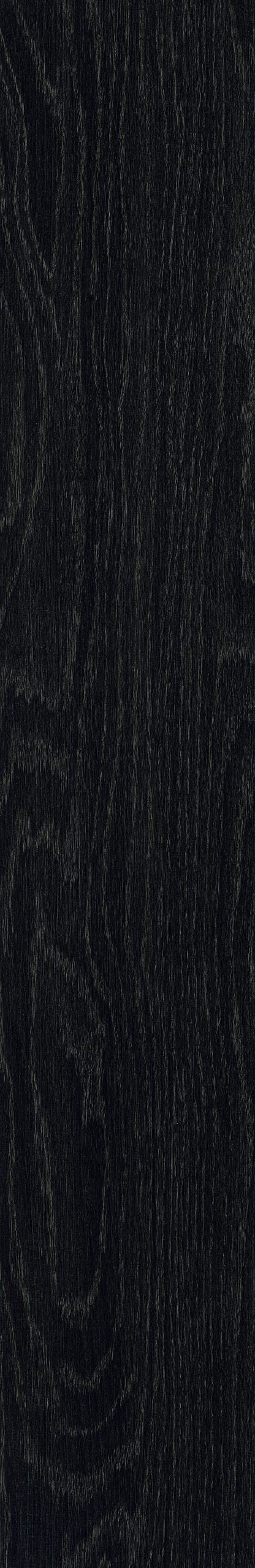 close up view of luvanto black ash plank lvt flooring