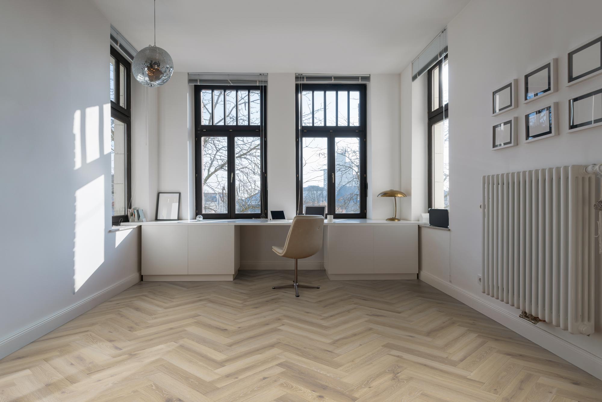 Parquet Norton Grey LVT flooring in a contemporary office study with elegant grey wood effect