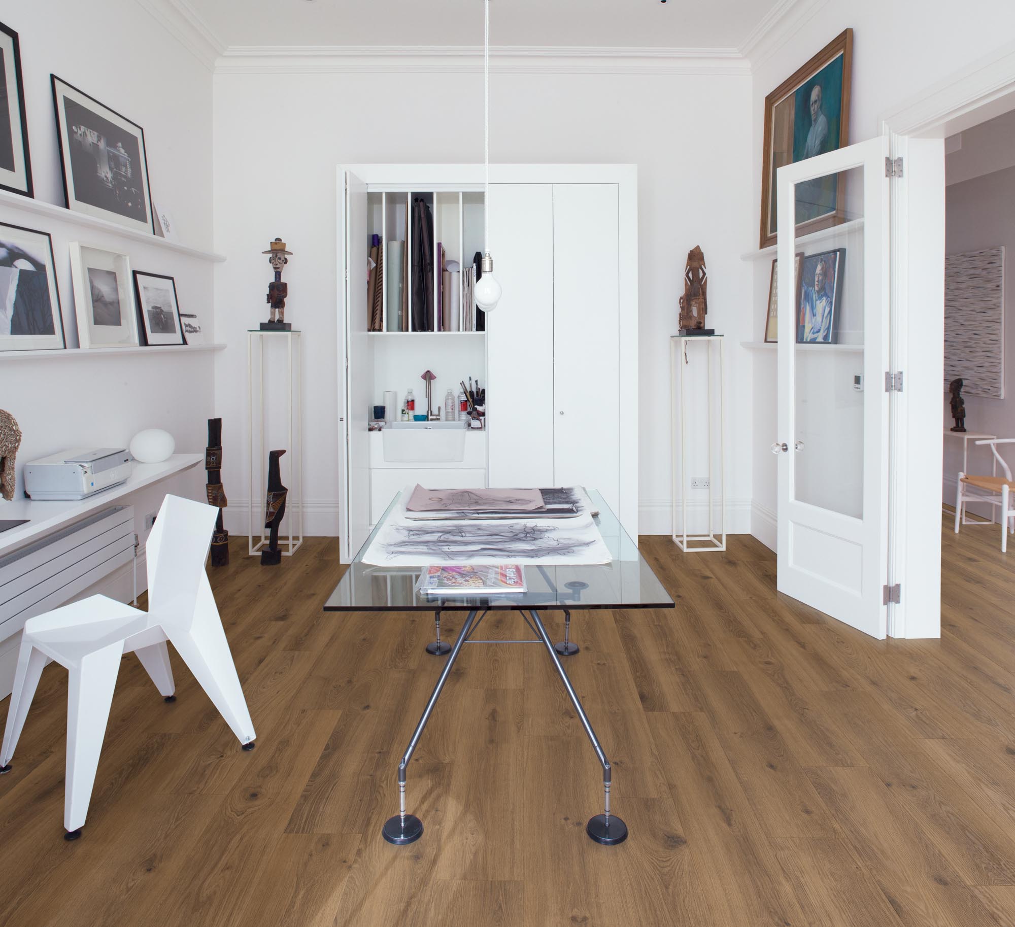 Rich chocolate wood-effect LVT plank by Rhinofloor, perfect for warm, stylish interiors.