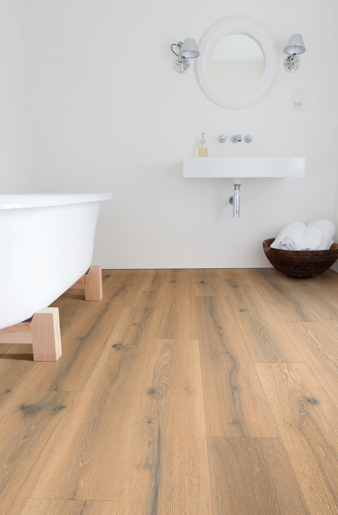 Elegant golden wood-effect Medburn Plank LVT by Rhinofloor for modern interiors.