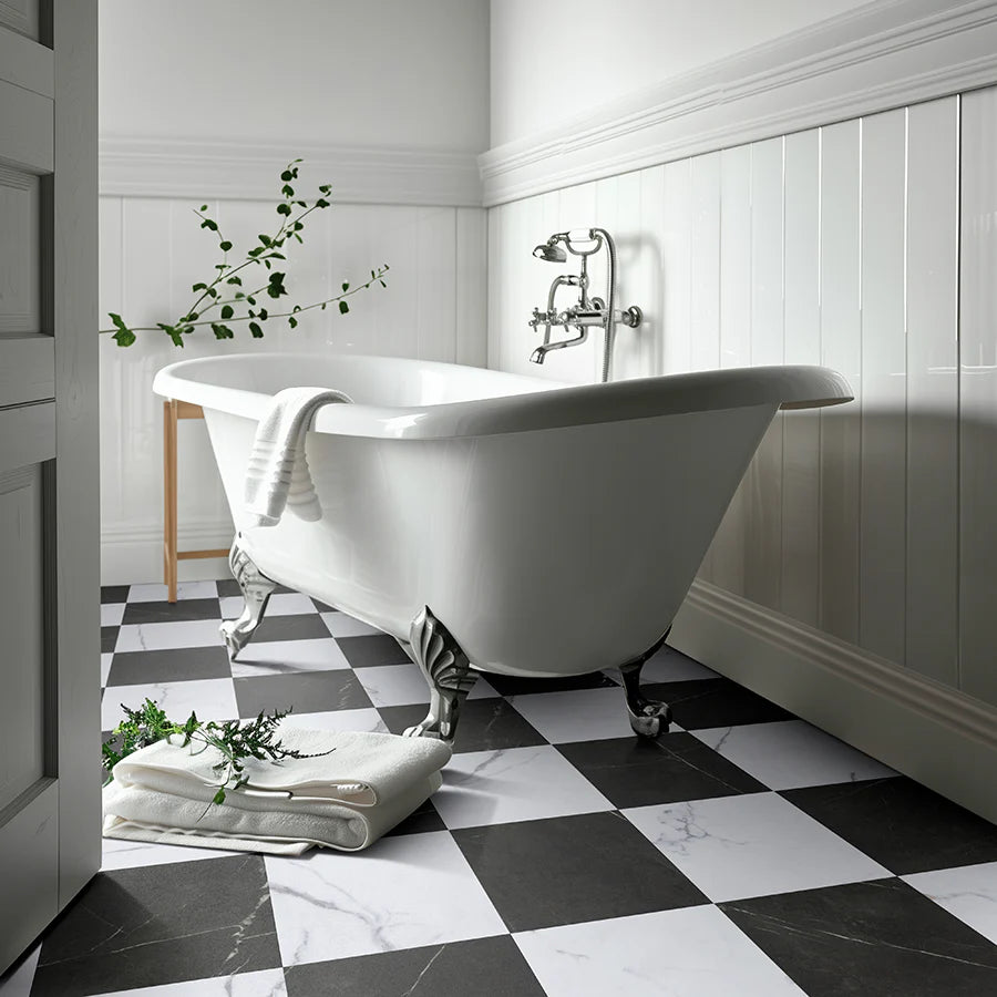 Luxurious bathroom featuring Brampton Chase Carrera Black Stones Marble LVT with a roll-top bath.