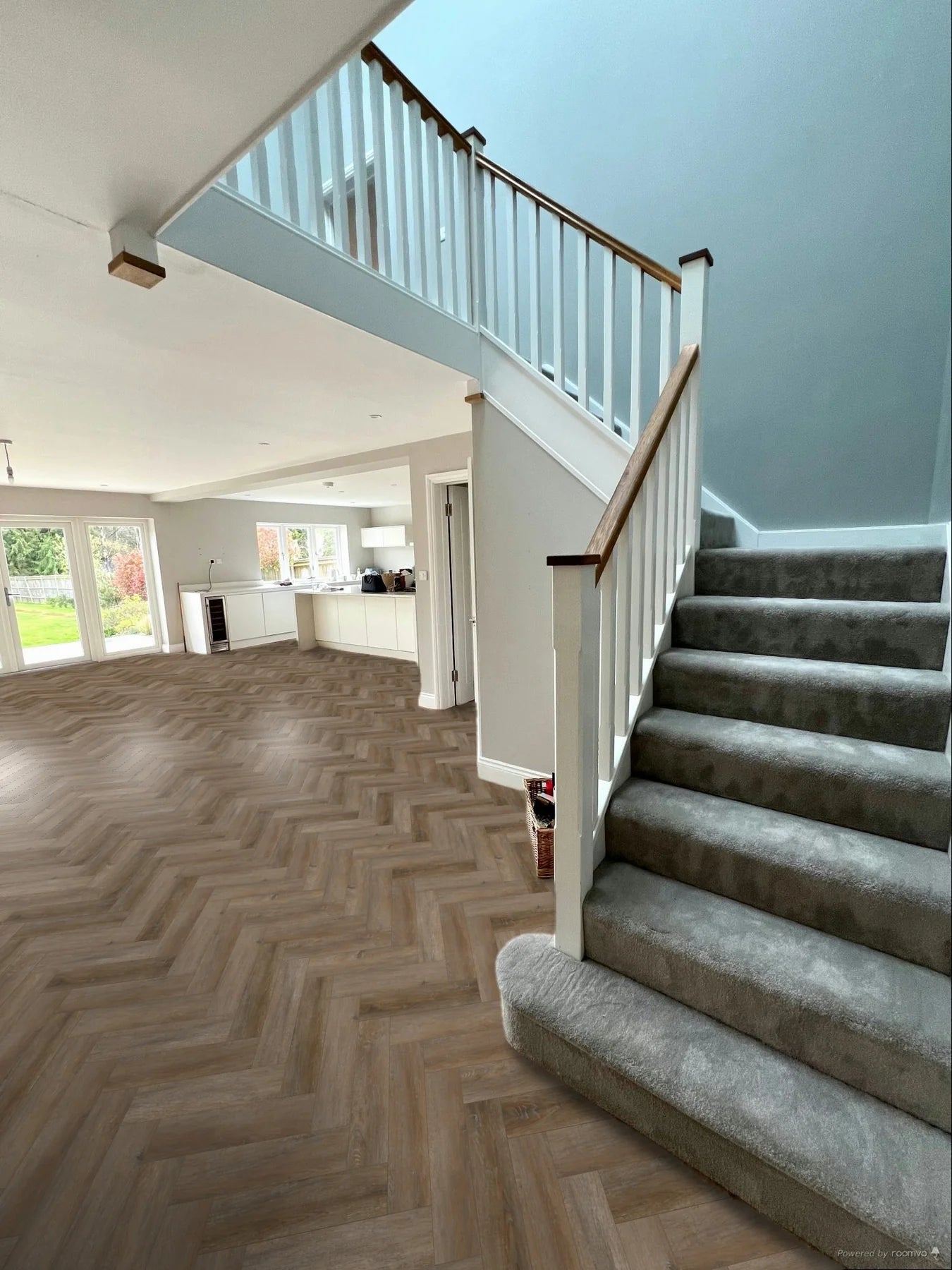 Smokey Bay small plank Herringbone LVT with subtle brown and beige and tones micro bevel edges.