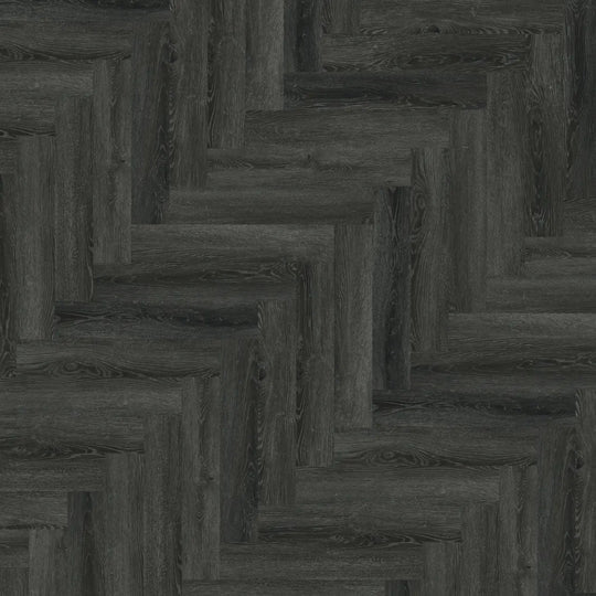 Close-up of Ebony Oak Herringbone luxury vinyl tile, offering a sophisticated look.