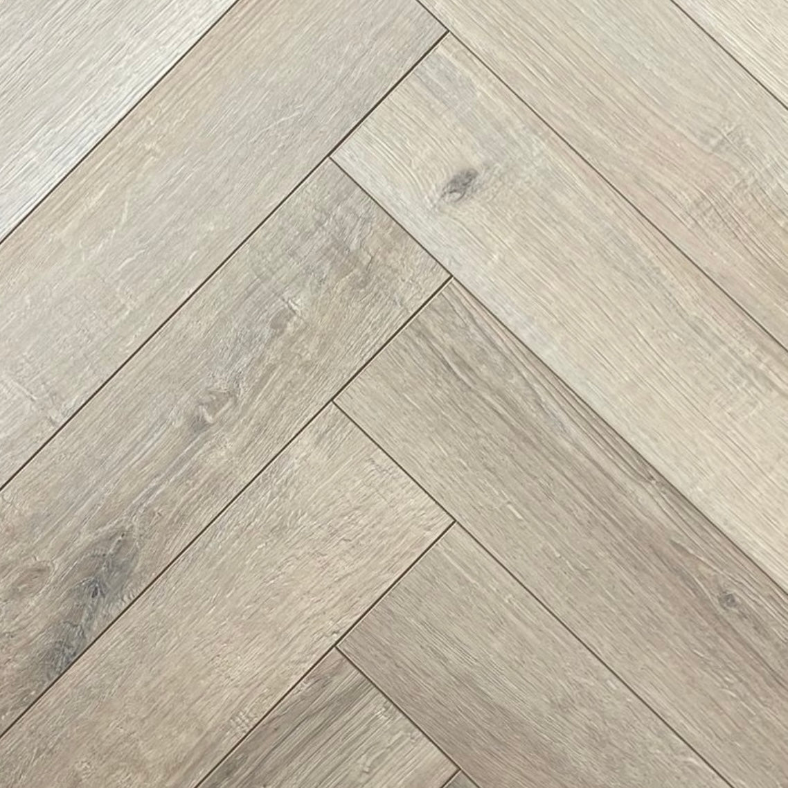 Sandstone Herringbone Laminate 12mm Click Fit Flooring