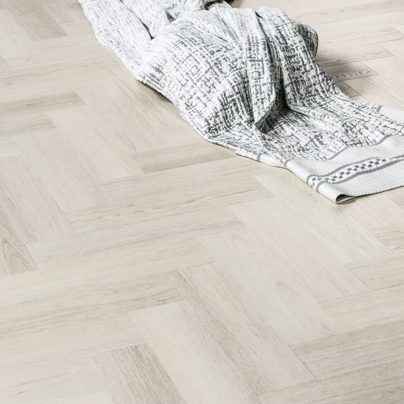 Nordikka Naturals Pale Birch Herringbone LVT Flooring | 0.7mm Wear Layer