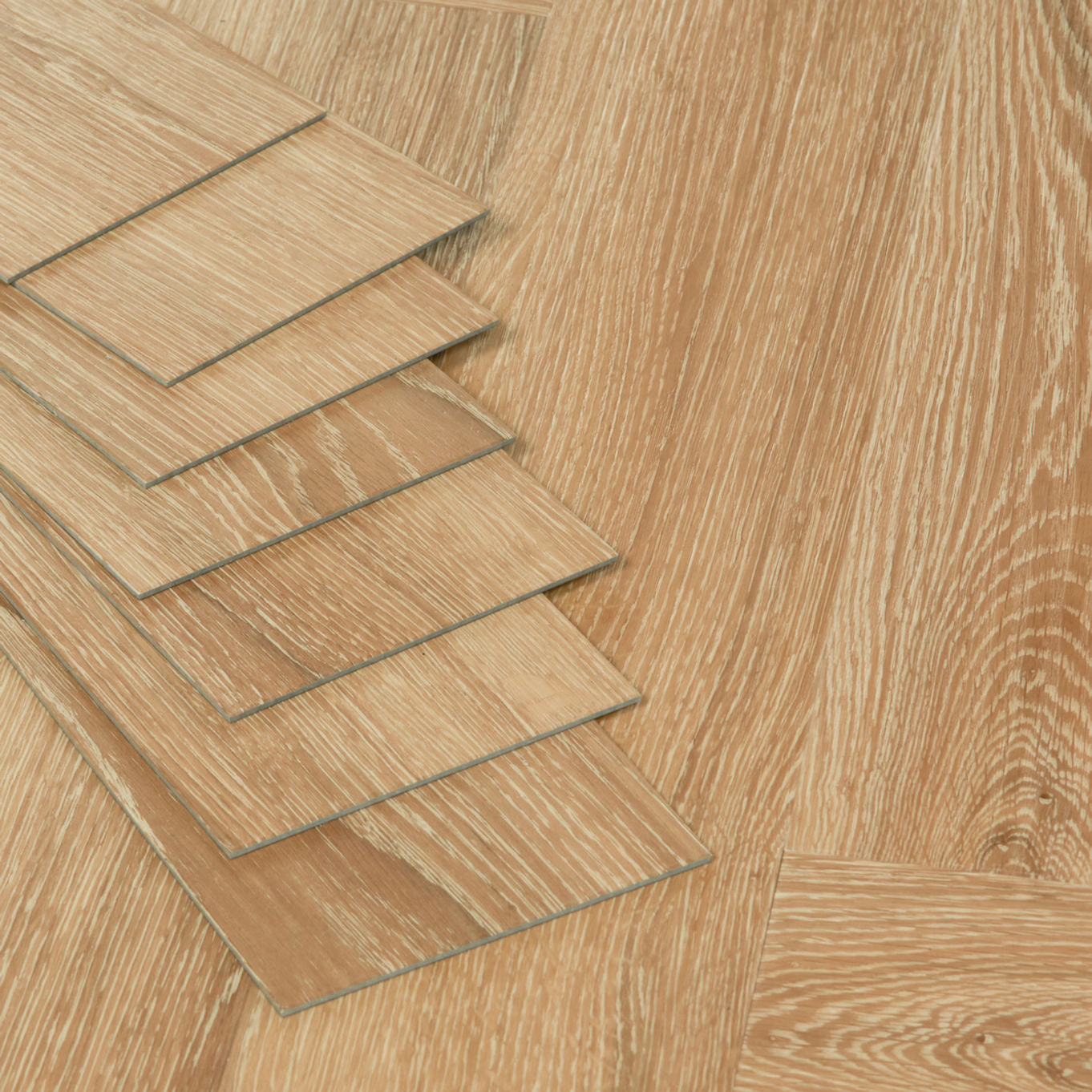 Nordikka Select Honey Oak Herringbone Glue Down LVT Flooring