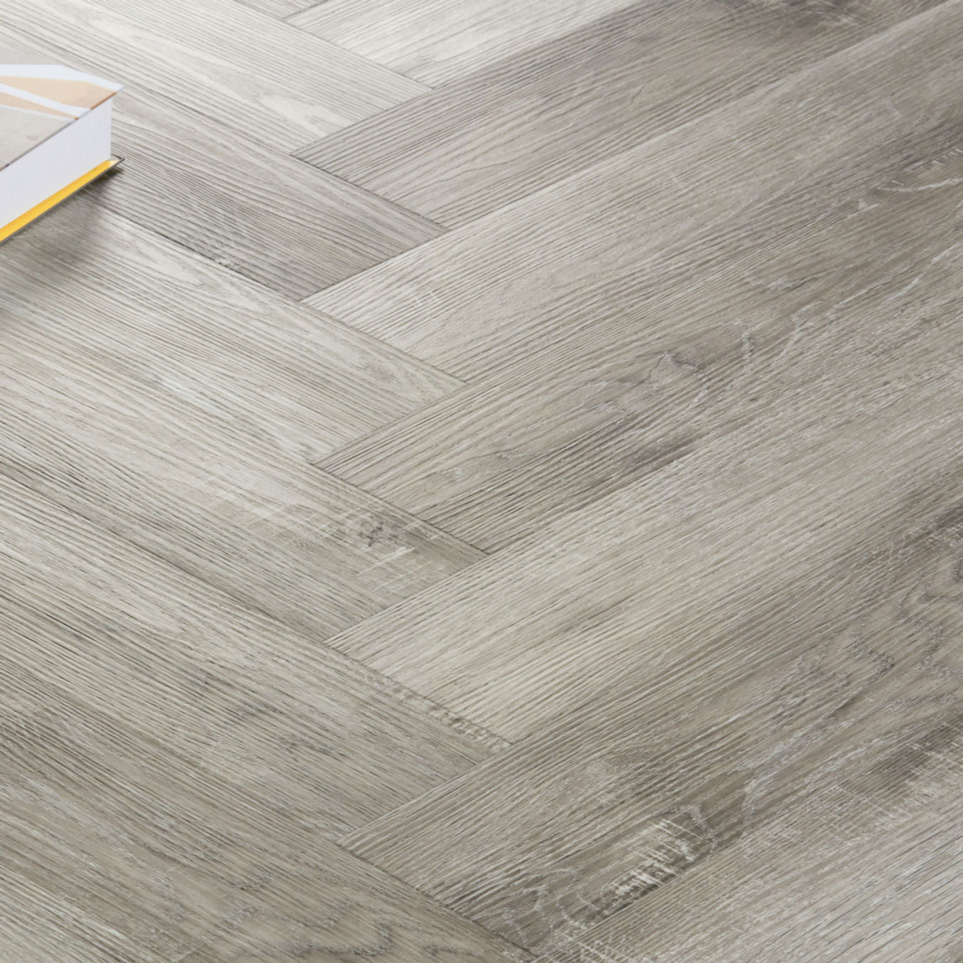 Nordikka Select Smoked Ash Herringbone Glue Down LVT Flooring