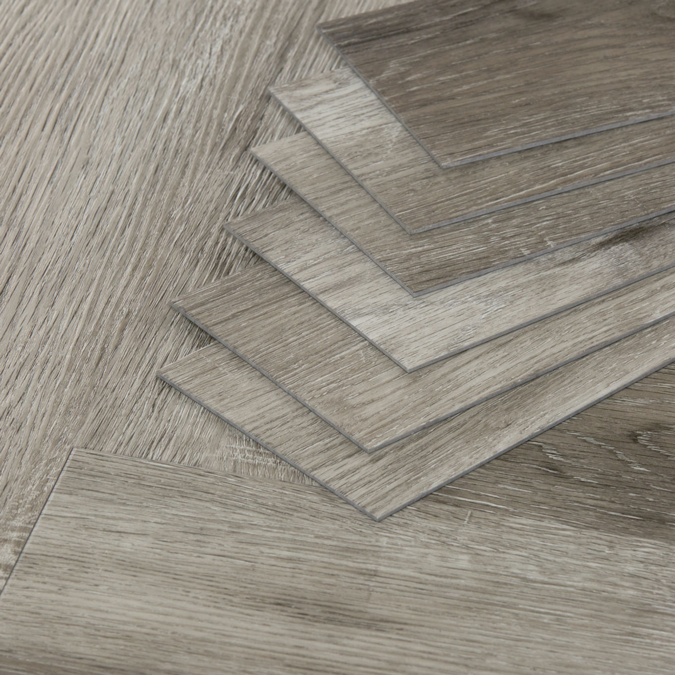 Nordikka Select Smoked Ash Herringbone Glue Down LVT Flooring