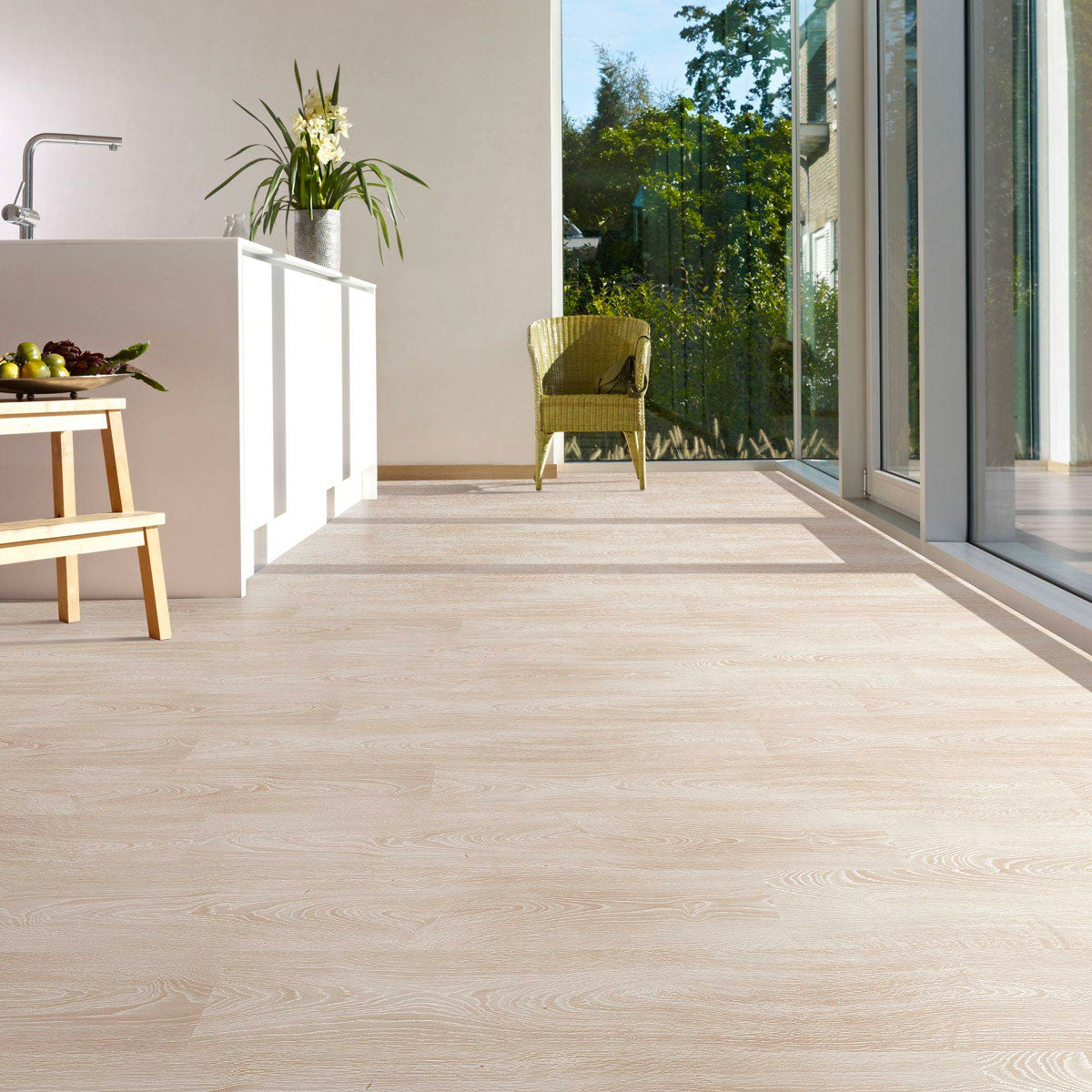 Love AQUA laminate flooring in Raindrop, featuring soft, cool tones.